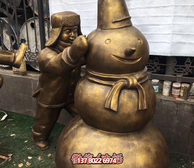 景区铜雕堆雪人儿童雕塑戴帽子