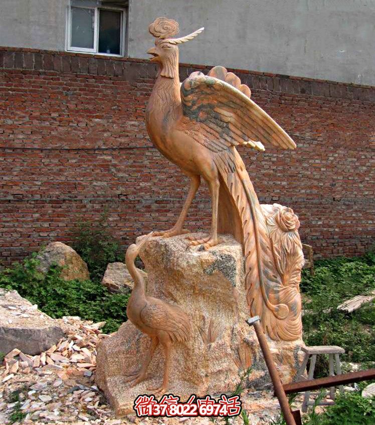 红晚霞下的凤凰石雕——精美的户外景区雕塑