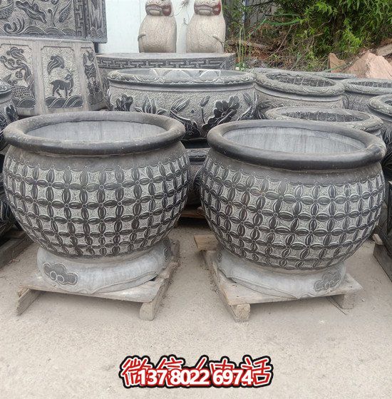 自然美学结合青石石雕、浮雕、编织、雕塑的户外园林鱼缸