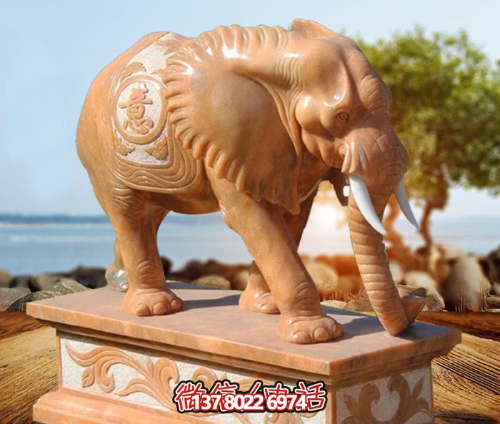 户外景区晚霞红石雕大象雕塑