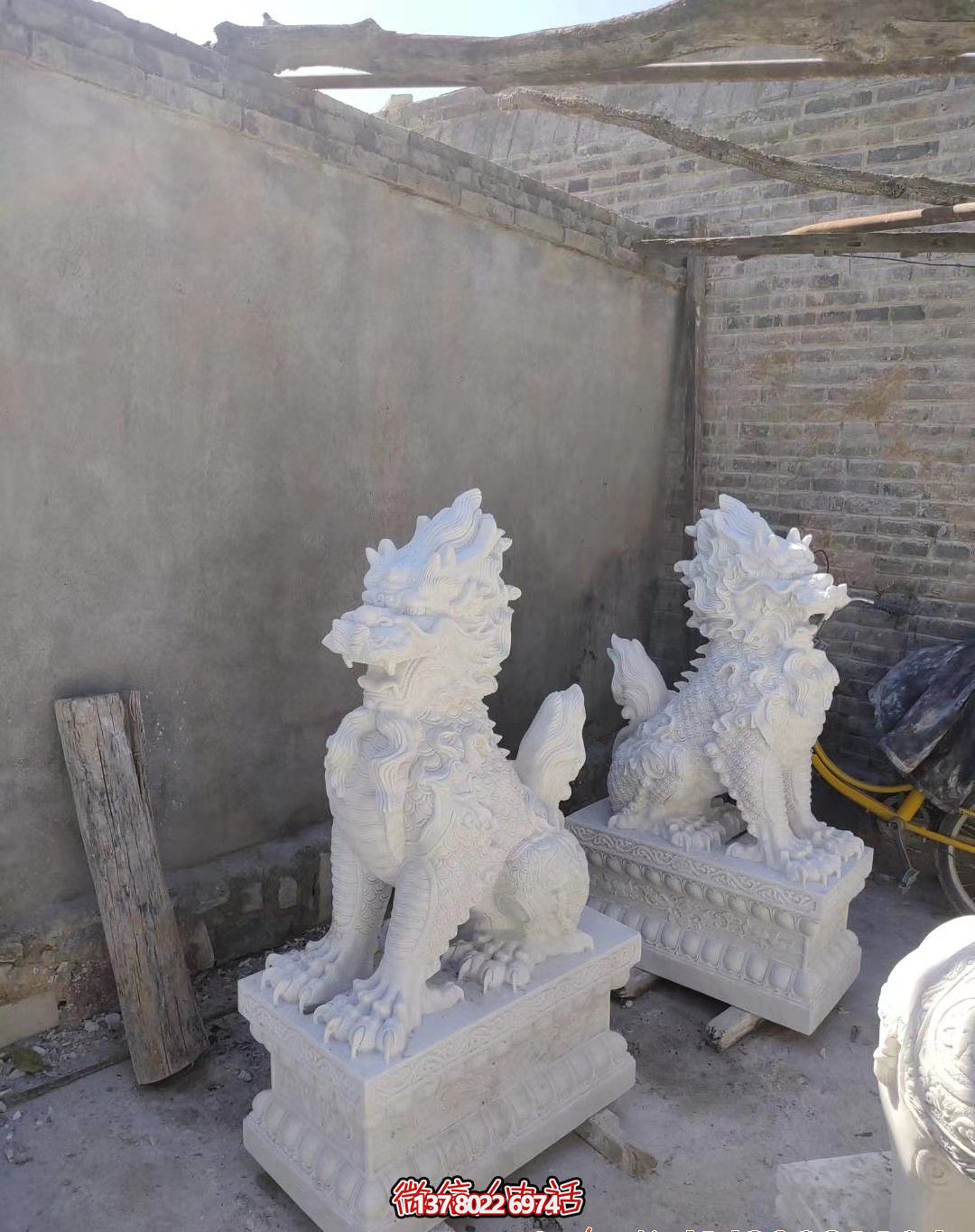 饭店门口汉白玉石雕麒麟雕塑