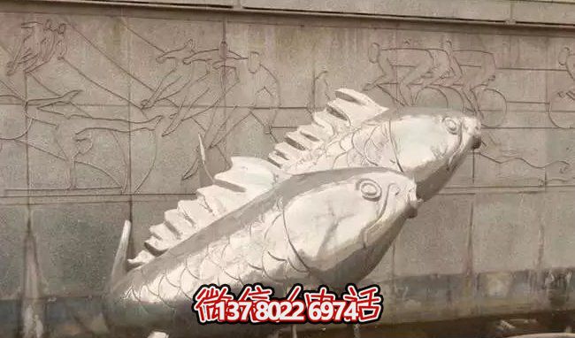 庭院里摆放的双鱼玻璃钢创意乒乓球雕塑