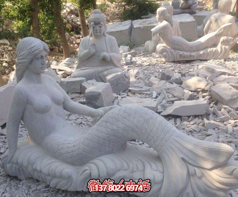 街道上摆放的汉白玉石雕创意美人鱼雕塑