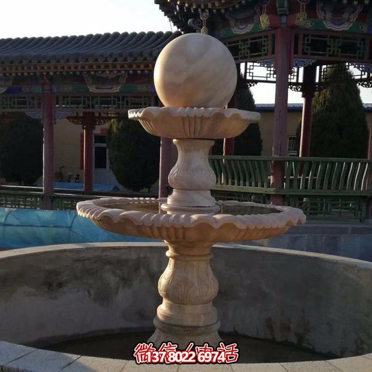 中式庭院水池摆放晚霞红雕刻二层风水球