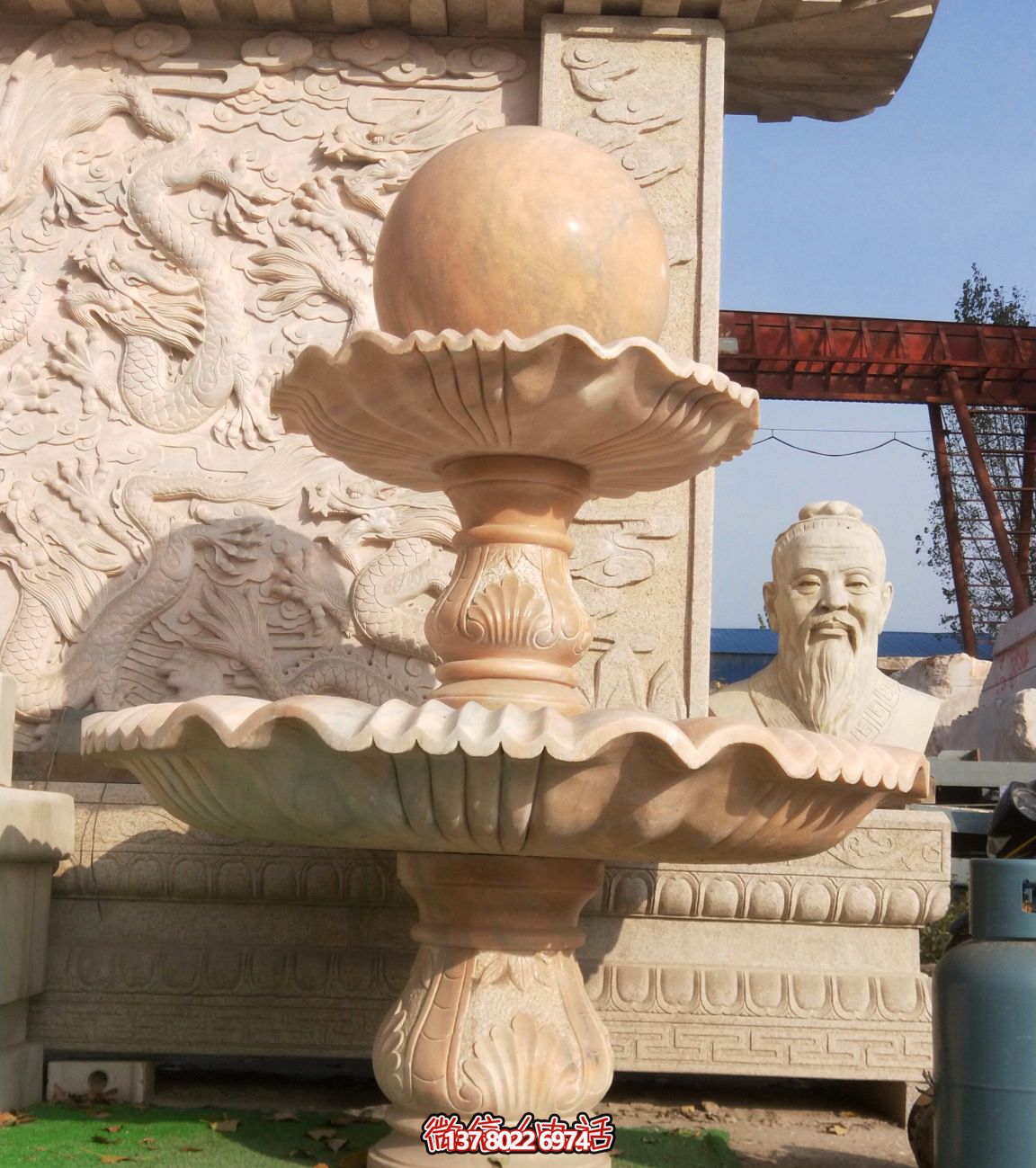 公园广场晚霞红石大风水球喷泉雕塑