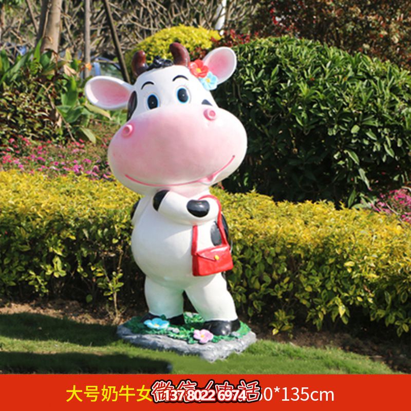 公园一只大号提包的玻璃钢牛雕塑